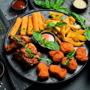 Alitas de pollo, nuggets, pop corn chiken